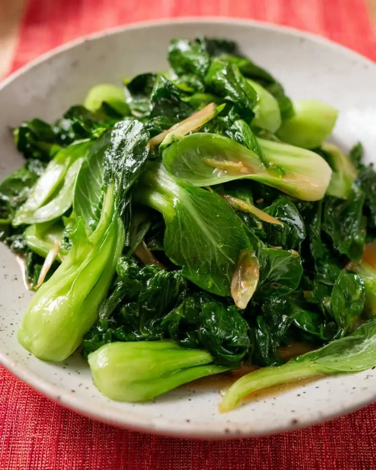 Delicious Gai Lan Stir Fry with Oyster Sauce served in a bowl.