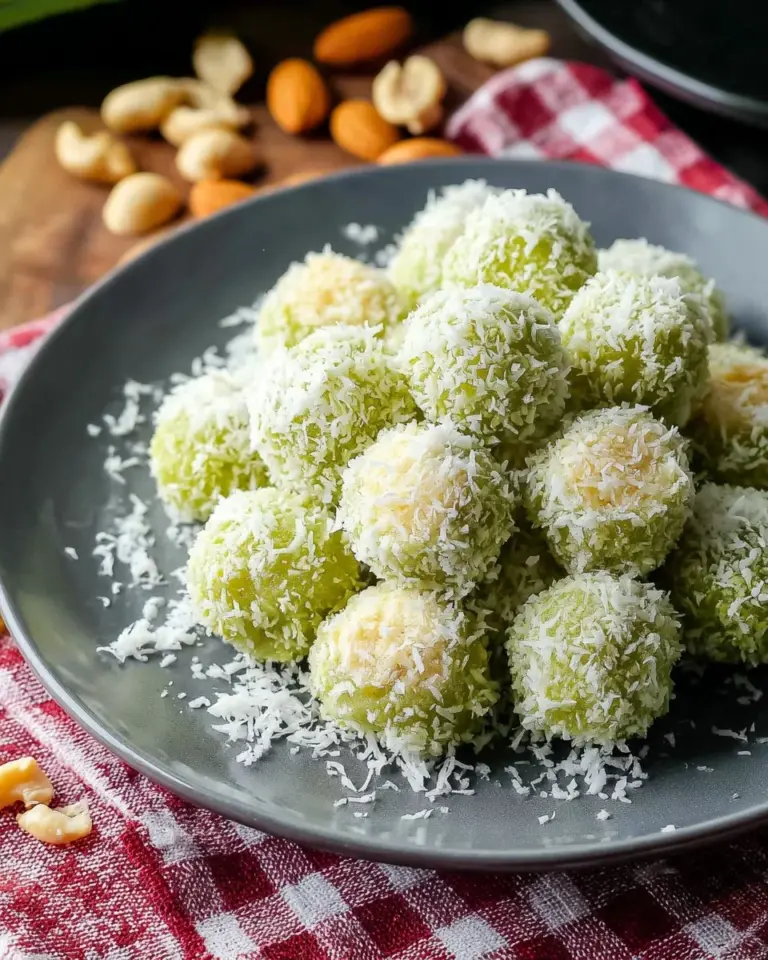 Delicious Pandan Coconut Dumplings with a vibrant green color and coconut filling